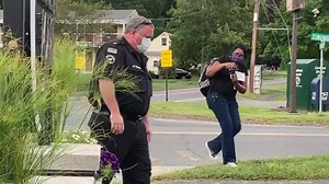 9.5K views · 166 reactions | Williamstown Police Department, Massachusetts Lt. Mike Ziemba joins Bilal Ansari in placing a Black Lives Matter sign in front of the station during a Friday evening demonstration. Story: https://www.iberkshires.com/story/62886/Protesters-March-to-Williamstown-Police-Station-to-Demand-Reform.html | iBerkshires.com | Facebook