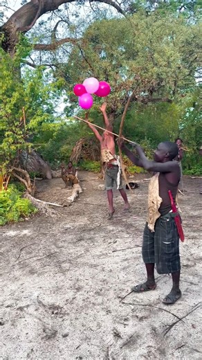 Hadza shoot arrows with balloons above#usa #africa #funny #tending #comedy