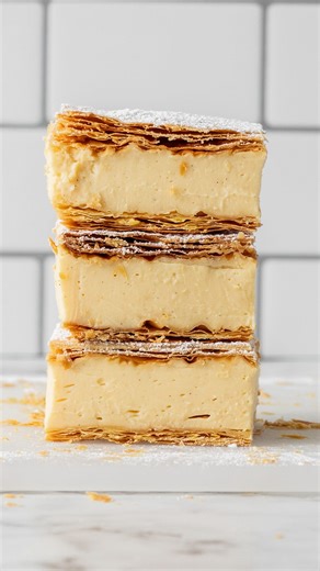 My favorite thing about my Vanilla Slice is how creamy and smooth the filling is. It’s infused with vanilla beans so it screams vanillaZ It sets perfectly and goes so well with the buttery flaky puff pastry. Comment ‘vanilla’ and I’ll DM you the recipe! When it comes to getting clean slices, you want to use a serrated knife and go slow.Then once you get through that first layer of puff, switch to a sharp knife and slice through the custard and snap through the bottom. https://thescranline.com/cl