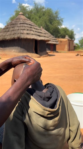 African nyako | Shaving hair in the village | Instagram