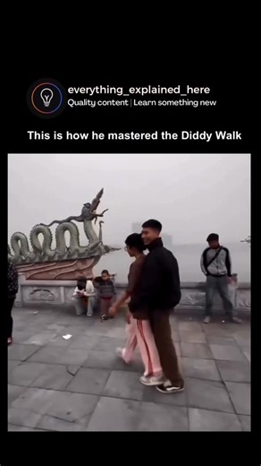 Explainer Hub on Instagram: "This looks like a simple walk — but it’s not. The Diddy Walk works because of three key things happening at the same time: 1️⃣ Controlled rhythm The steps are slow and evenly timed, which tricks your brain into expecting movement that never fully comes. 2️⃣ Upper-body relaxation The shoulders stay loose while the lower body moves, creating a smooth contrast that feels effortless. 3️⃣ Micro bounce A subtle vertical bounce keeps the walk fluid instead of stiff — that’s