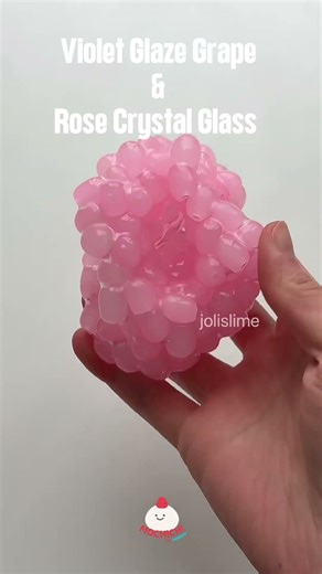 Crunching a purple and a pink grape-seed stress ball