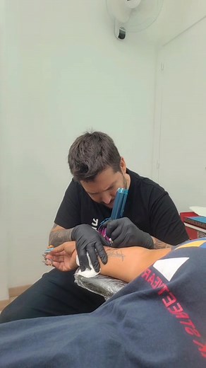 Professional Tattooing Process: A Close-Up Experience