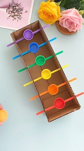 245K views · 1.3K reactions | kindergarten crafts: don’t throw away used cartons and bottle caps. i’ll teach you how to make a fun ball passing toy in a few simple steps. #parentchildhandicraft #homemadetoys #upcyclecraft #handmadediy #childhandicraft #creativecrafts #diyprojects #recycledcrafts #kidscrafts #funprojects | paper craft ideas | Facebook