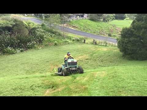 Steep slope mowing with modified John Deere 4wd Ride-on mowers