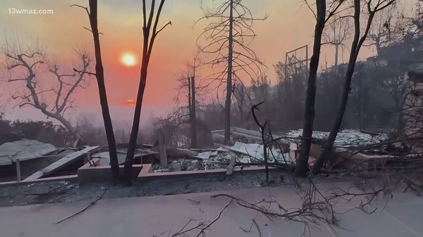 LA-area fire prompts more evacuations, officials say over 10,000 structures burned, death toll rises