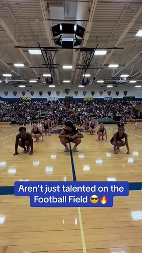 High School Football Seniors Showcase Dance Moves at School Assembly