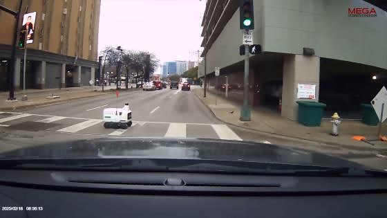 Vehicle collides with robot in bizarre traffic accident