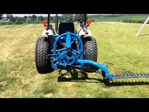 Ford 501 seven foot 3pt sickle mower mounted on Ford New Holland 1720