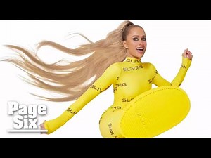 Paris Hilton hilariously struggles to remove Crocs’ new enormous boots