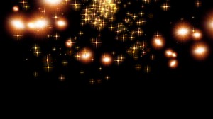 Download Gold flying glitter star over black background for free