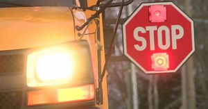 Mother charged after boarding Warren Township bus to fight student