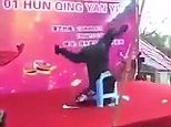 Hilarious moment man fails handstand and smashes plastic chair