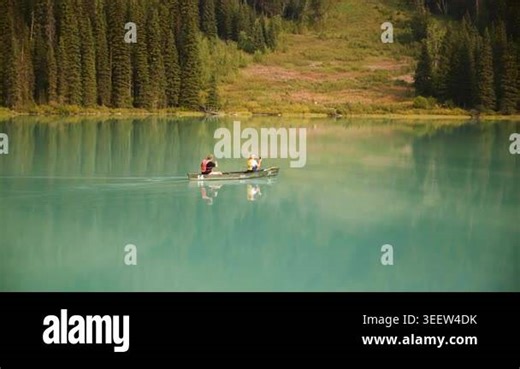 Yoho, Canada - 2 apr 26: Two people paddling a canoe on the turquoise Emerald Lake, Yoho National Park, Canada. Road trip in Canada. Rocky mountains. 4k footage Stock Video Footage - Alamy
