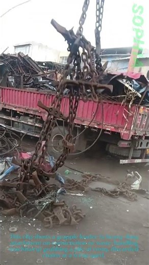 Scrap Metal Handling: Grapple Loader Lifting Rusty Chains