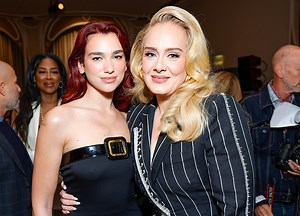 'Newlywed' Adele Is All Smiles In Custom Pinstripe Suit