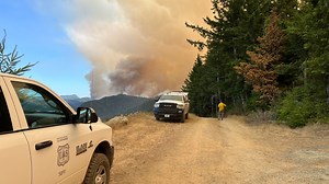 Anvil Fire sparks spot fire, Flat Fire containment holds steady