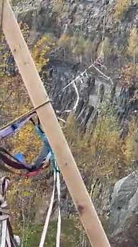 slackliner tumbles in strong winds