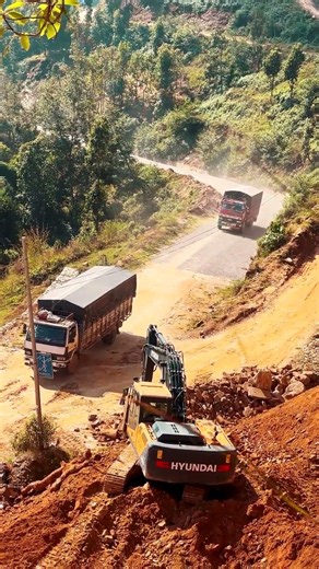 Powerful Hyundai Excavator Working on Mountain Road Construction