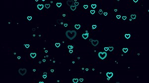 Download Light blue heart particle motion background. Faded wallpaper animation with black color. Flying bubble. for free