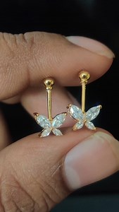 ₹2300 pair gold plated silver. ₹2100 pair pure silver bugadi without any plating. Butterfly diamond look design. The size of design and colour of stones can be modified and made as per client instructions. Pure silver. All bugadi design can be made -1) straight bugadi, 2) hanging bugadi, or 3) curved bugadi. We make our own jewellery. We dont buy from suppliers so if you want to make any changes in design that is also possible. If you want to get any design in a different size (smaller or bigger