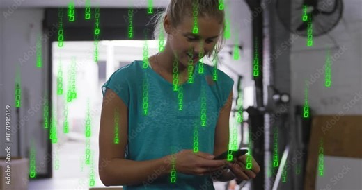 Woman holding smartphone scrolling content in workshop with binary code overlay showing data flow