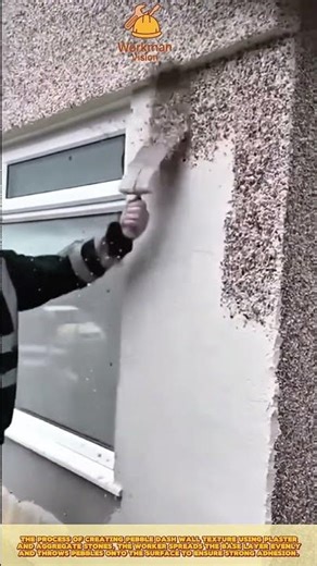 Skilled Worker Applying Pebble Dash Texture for Durable Exterior Wall Finish