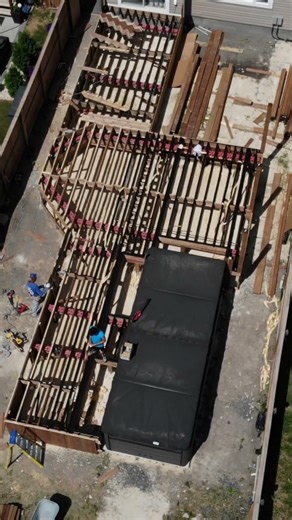 Checking on the progress of this huge deck! Look at how we frame this one!