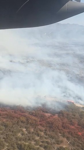 The 152nd Airlift Wing, Nevada Air National Guard, helps build a fire line to halt the progression of the Brad Fire in Southern California while using the Modular Airborne Fire Fighting System (MAFFS) this week. The 152nd and the 146th Airlift Wing, California Air National Guard, were activated Monday to assist federal aerial firefighters in Nevada and California. | Nevada National Guard