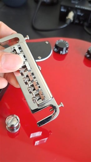 Installing intonatable wrap-around guitar bridge #guitar #guitaraccessories #diy #shorts