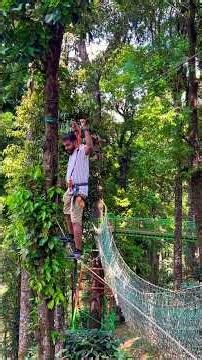 “Adventure🌿 Rope bridge challenge during our Kerala trip! Would you try this? 😄”