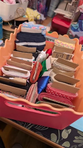 Let's get some organising done! I'm embarrassed to admit that I didn't know I owned half the ribbons I did as they were living as a giant tangle in a shopping bag 😅 But with some scrap cardboard and pins they take up way less space and I can actually see what I have! This was so simple and successful I've actually done the same with my lace, bias binding and trims! #sewing #craftorganisation #organisation #craftroom | Bumblelion Boutique