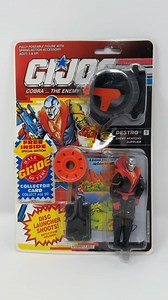 Check out my Destro from GI Joe series 11. This was released by Hasbro in 1992 and is the third version of Destro. Destro comes with a rifle and a disc launcher that actually shoots. Here is what he looks like all geared up. This figure comes with an offer for a free GI Joe Hall of Fame collector card. Destro makes his first full comic series appearance in issue #14. Destro first appeared in the MASS Device mini-series from 1983. #gijoe #sunbow #cartoonseries #realamericanhero #80s #eighties #80