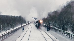 retro train Ruskeala express approaches the platform in the mountain park of Ruskeala