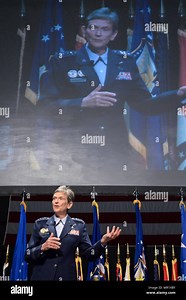Gen. Ellen M. Pawlikowski, Air Force Materiel Command commander, speaks in front of a giant video screen during a dual change of command ceremony May 2, 2017, in the National Museum of the U.S. Air Force at Wright-Patterson Air Force Base, Ohio. Lt. Gen. Robert D. McMurry Jr. and Brig. Gen. William T. Cooley assumed command of the Air Force Life Cycle Management Center and the Air Force Research Laboratory respectively. (U.S. Air Force photo/R.J. Oriez Stock Photo - Alamy