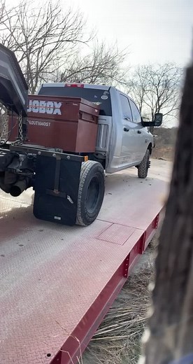 Don’t mind the straps🤣😂🤣 first time hauling a car and it was only worth $125k #hotshot #hotshottrucking #fyp #carhauler