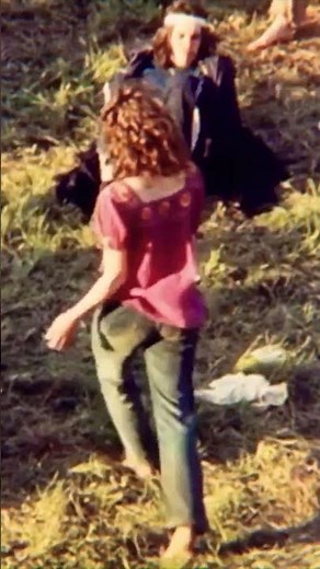 Hippie girl dancing to Greta Van Fleet