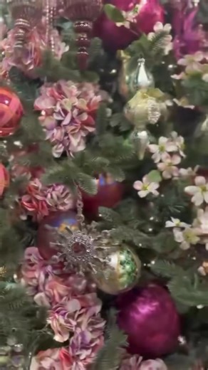 Celebrate the Magic of Christmas! This was the main tree in my Dallas showroom for 2025. Maybe one of my personal all-time favorites because we took gorgeous Christmas ornaments, then did the unexpected and added all sorts of beautiful silk flowers. The crowning glory are the stunning crystal swags that add such elegance to this rotating tree. Perigold.com, Nordstrom.com, Bloomingdales.com, Dillards.com | Mark Roberts