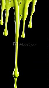 Dripping green slime with blobs on black background, seamless border pattern, radioactive liquid with drops flowing, vertical 4k video. Glowing green liquid dripping down black background