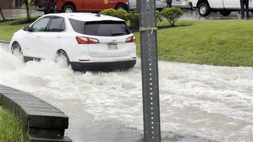 This is next to the Sheetz near Milford St. in Clarksburg. Officials set up Road Closed signs to deter residents from driving through the flooded roadway. | WDTV 5 News
