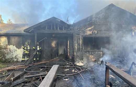 Early-morning fire destroys 104-year-old NW Bend home; resident awakens to smell of smoke, all 8 escape safely