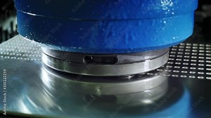 Perforation Manufacture Machine Cuts Holes in the Metal Sheet, Close Up