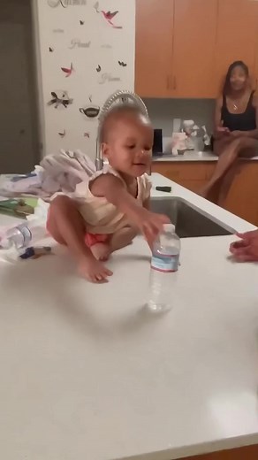 Baby Laughs During Water Bottle Flip Challenge