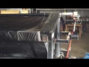 Smooth-Roll Tarping System for Side dump trailers