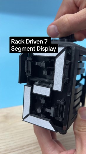 The Rack Driven 7 Segment Display ••• This mechanism uses the inverse cams from my last video to push and pull on a rack and pinion. The pinion is connected to the segment on the front of the display, and shows/hides the segments according to which number is being displayed. ••• The whole thing is made with just 3d printed parts that snap together. The STL files are available on JBVCREATIVE.com or free for my thangs members- link is in bio! ••• #mechanicalengineering #mechanicalsculptures #engin