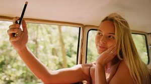 Attractive Woman Using Mobile Takes Selfies Stock Footage Video (100% Royalty-free) 1018701247 | Shutterstock