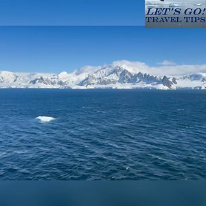 Arriving in Wilhelmina Bay brings back incredible memories. Last time, fog hid the mountains, but whales were everywhere! Excited to see what this visit holds. Ready for adventure! #letsgotraveltips #CruiseNews #WilhelminaBay #Antarctica #WhaleWatching #TravelMemories #AdventureTime | Let's Go Travel Tips