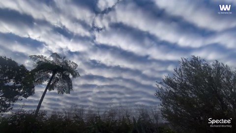 Rare sighting of mackerel sky over Brisbane drifts like waves