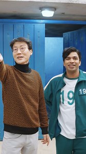 Netflix US on Instagram: "Step onto the set of SQUID GAME: THE CHALLENGE with a behind-the-scenes tour featuring the director of Squid Game, Hwang Dong-hyuk and special guest Anupam Tripathi! 🦑 #GeekedWeek"