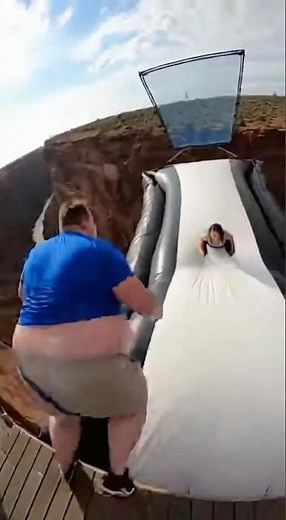 Cliff catapult is insane! 😱💥 Guy jumps & launches friend into sky #FunnyMoment #ExtremeChallenge